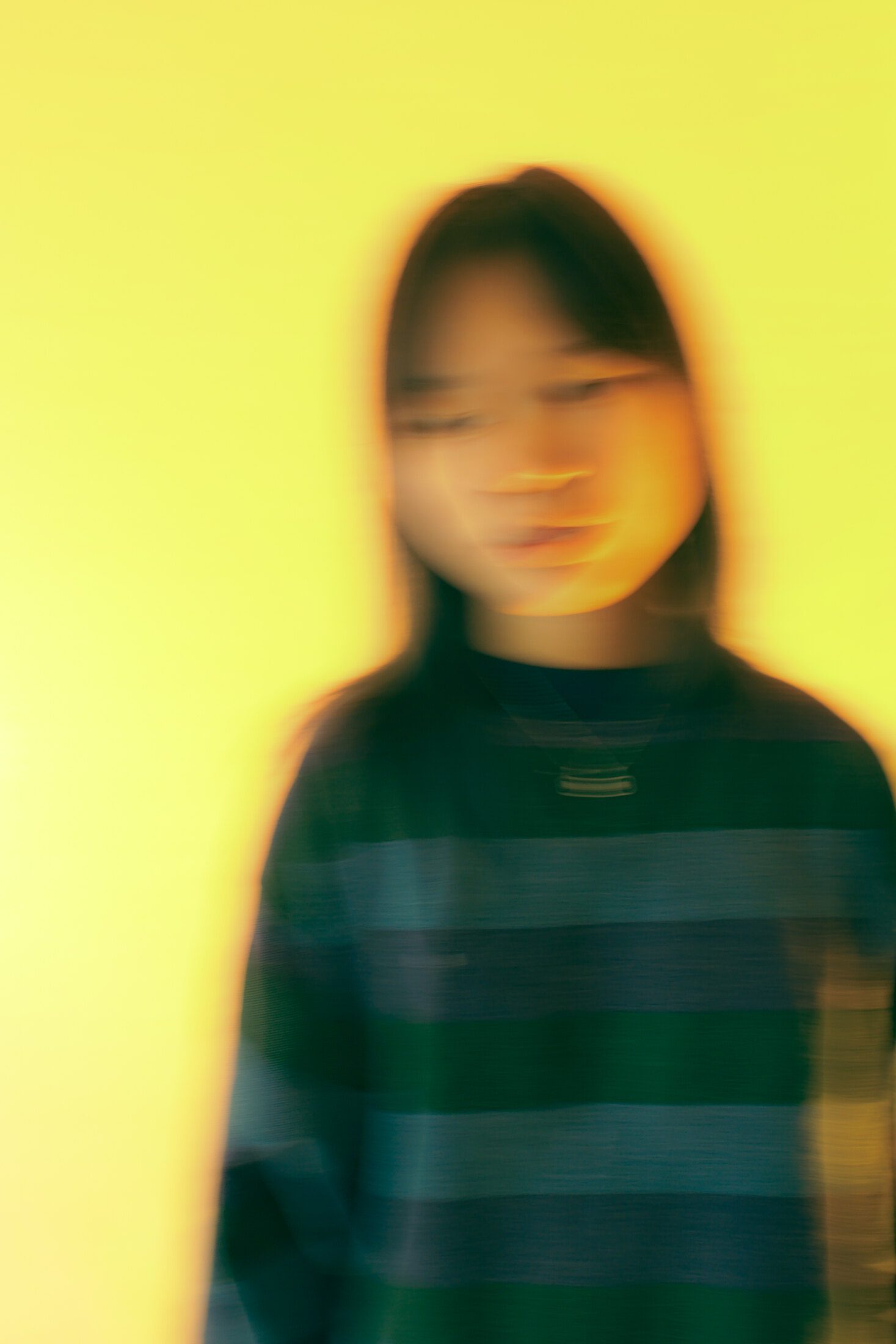 Yellow motion-blurred portrait