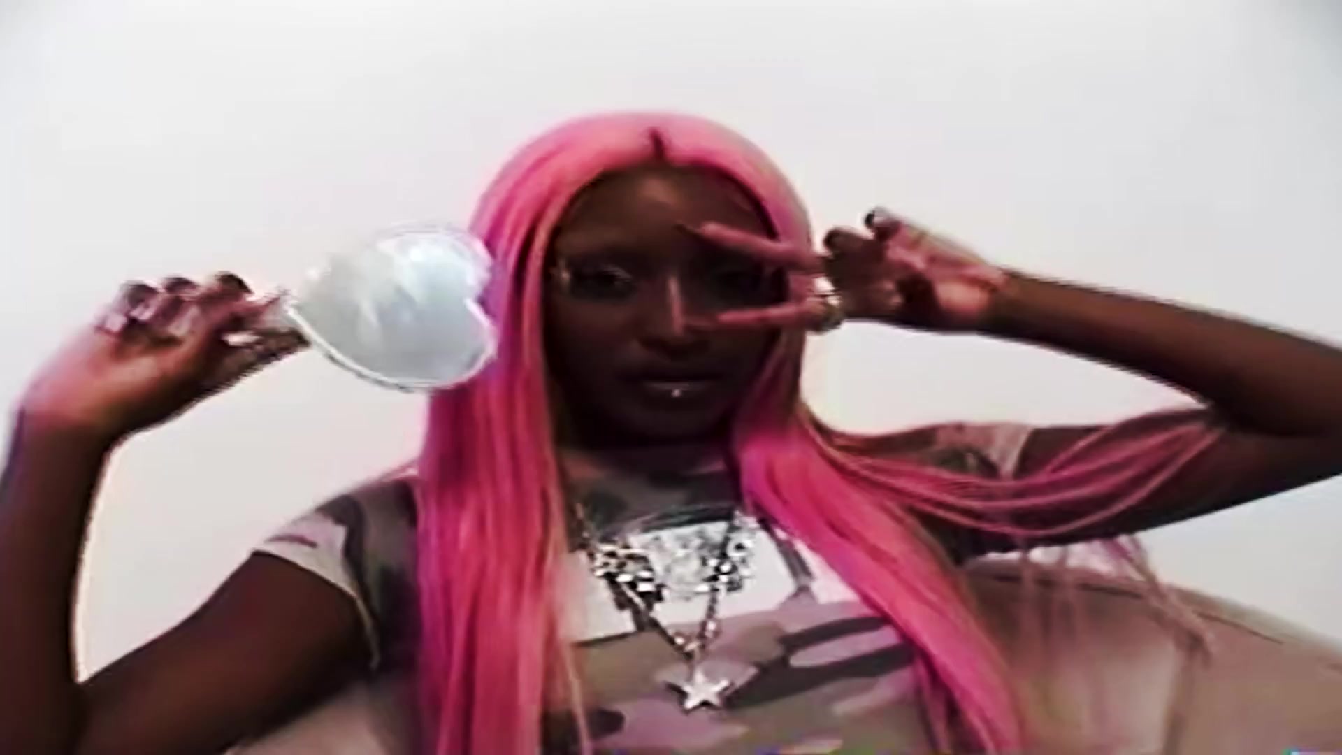 Pink-haired portrait film still from IDK by Neiori